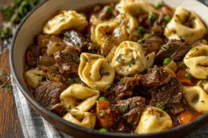 French Onion Beef and Tortellini Recipe in skillet with cheese