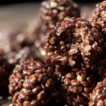 No bake chocolate quinoa crunch clusters stacked in a bowl